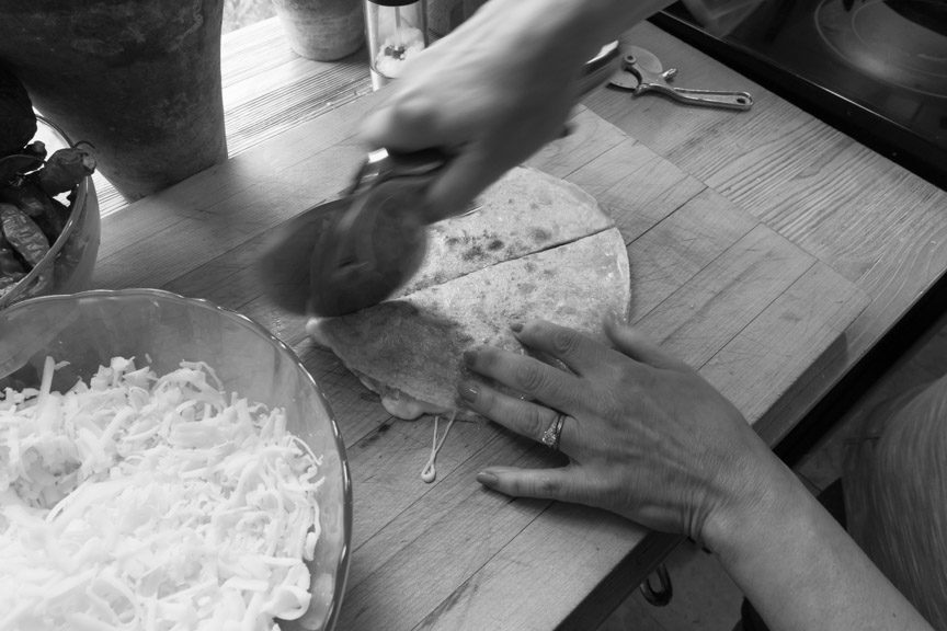 pizza wheel cutting quesadilla