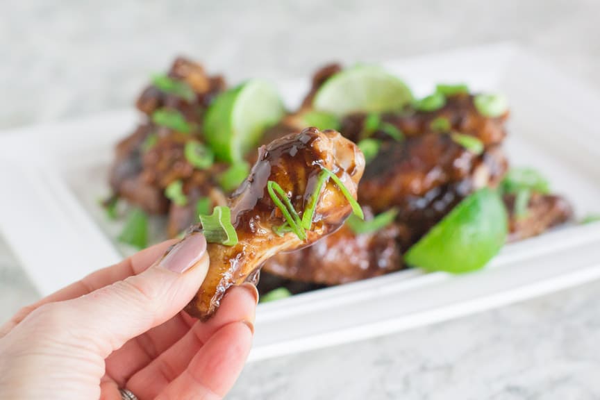 Monash University Certified Low FODMAP 5 Spice Chicken Wings- Take a bite! Learn more at FODMAPeveryday.com