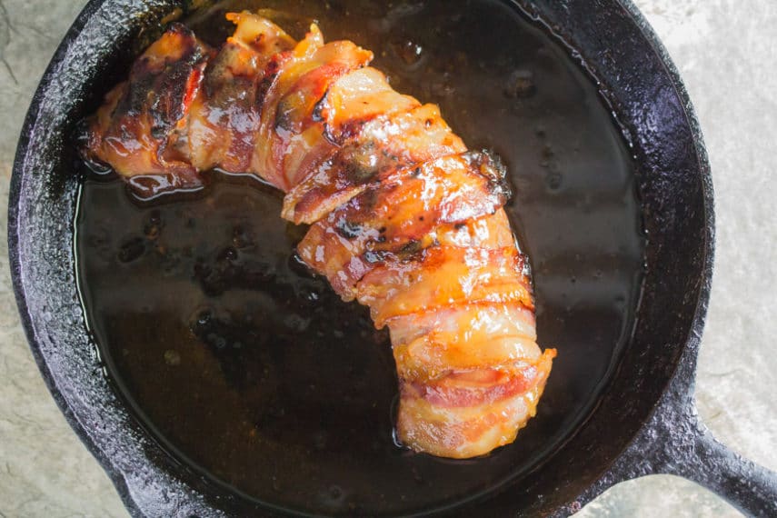 Low FODMAP bacon wrapped pork loin in pan