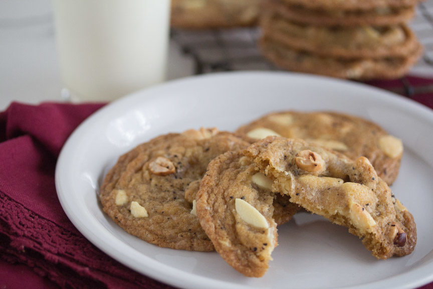 Three espresso white chocolate chunk cookies on a plate. 