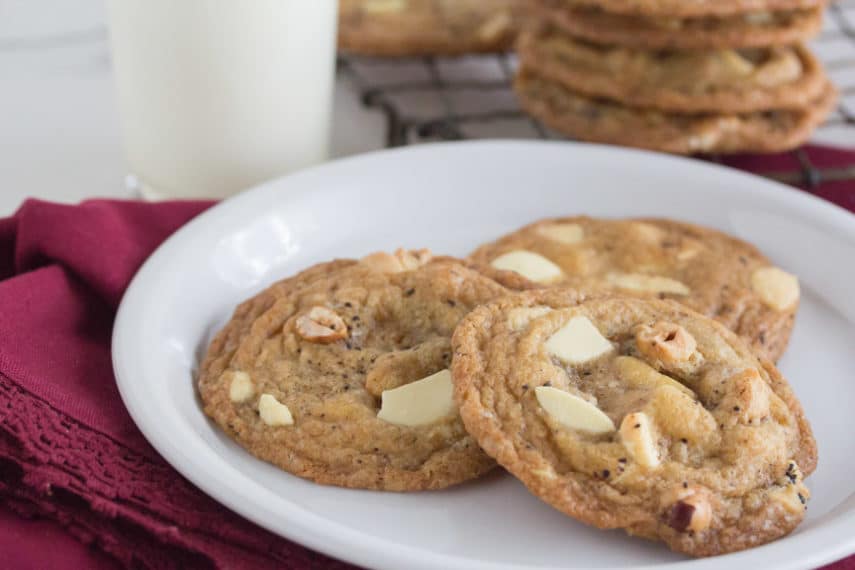 Three espresso white chocolate chunk cookies on a plate, waiting to be eaten!