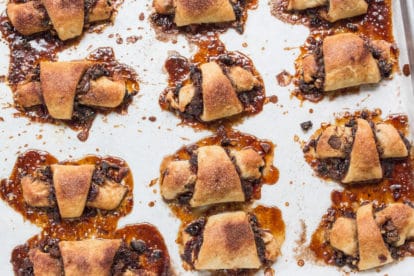 Baked rugelach with cherries and chocolate.
