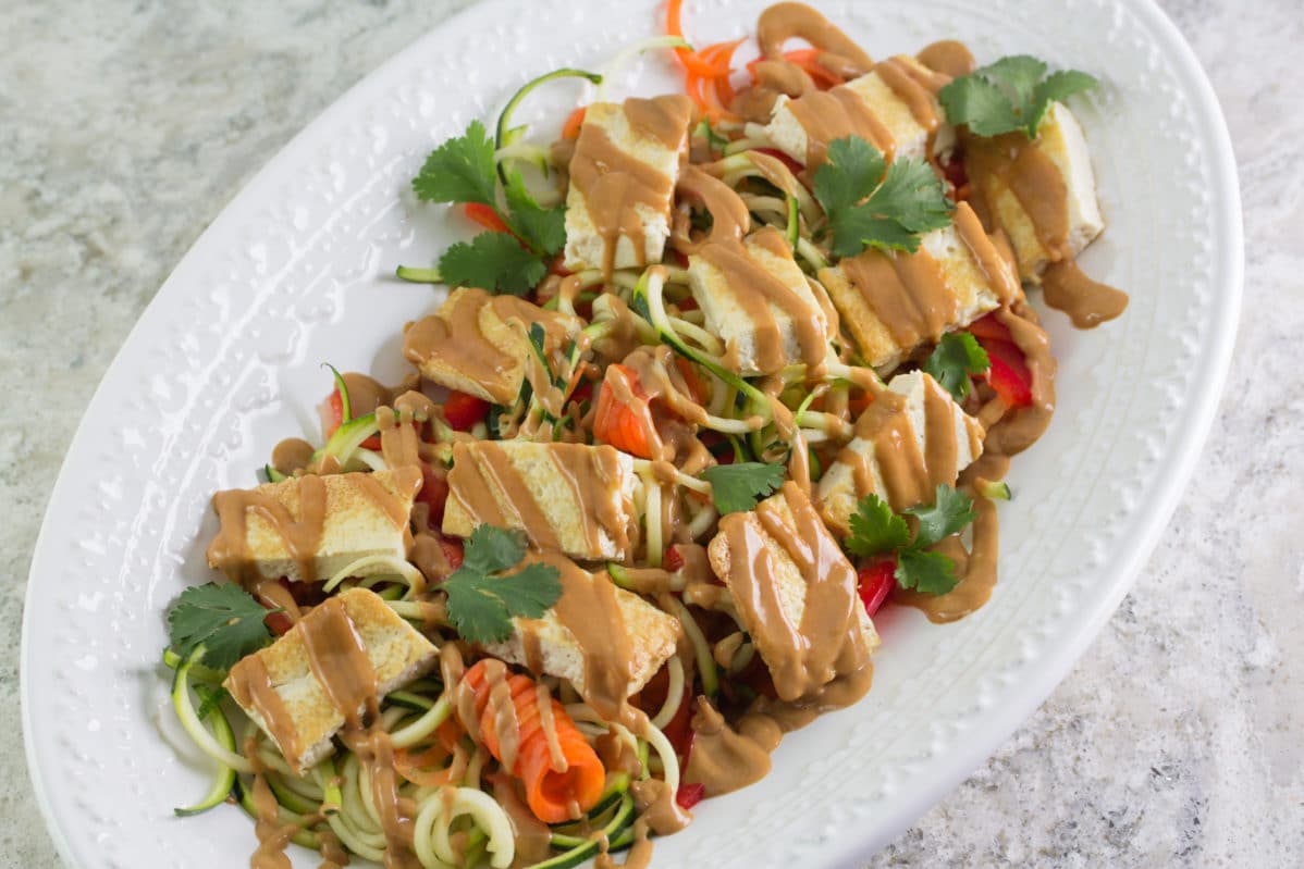 Low FODMAP zoodles & tofu with garlicky peanut sauce