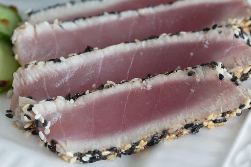  Low FODMAP Sesame Crusted Tuna sliced on a plate. 