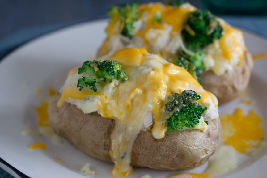 Low FODMAP baked potatoes stuffed with chicken, cheese and broccoli