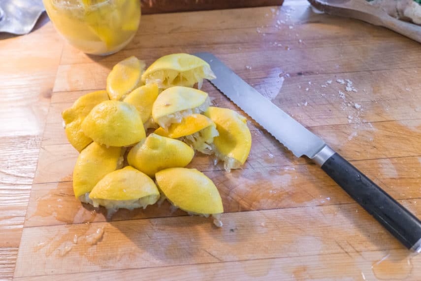 squeezing lemons for preserved lemons