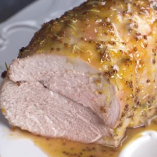 pork loin with maple mustard sauce closeup