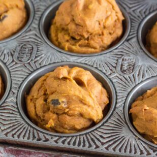 pumpkin raisin muffins in pan