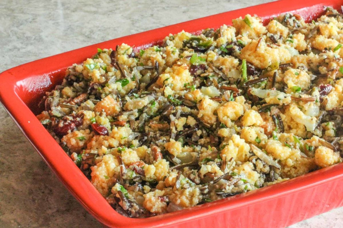 cornbread wild rice stuffing in a red casserole