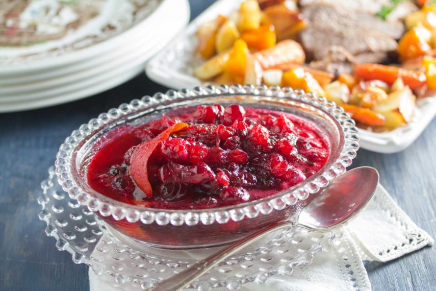 Citrus cranberry sauce in a glass dish on the table. 