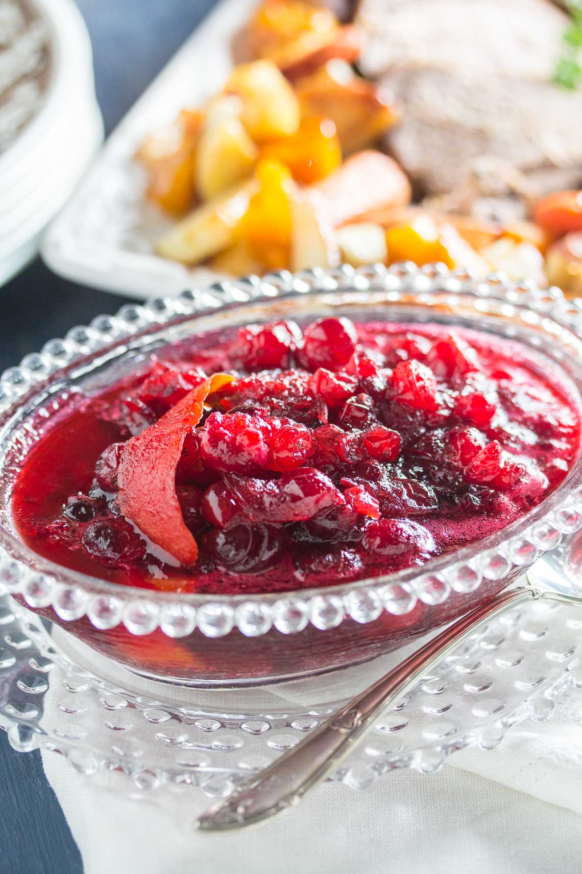 Citrus cranberry sauce in a glass dish on the table. 