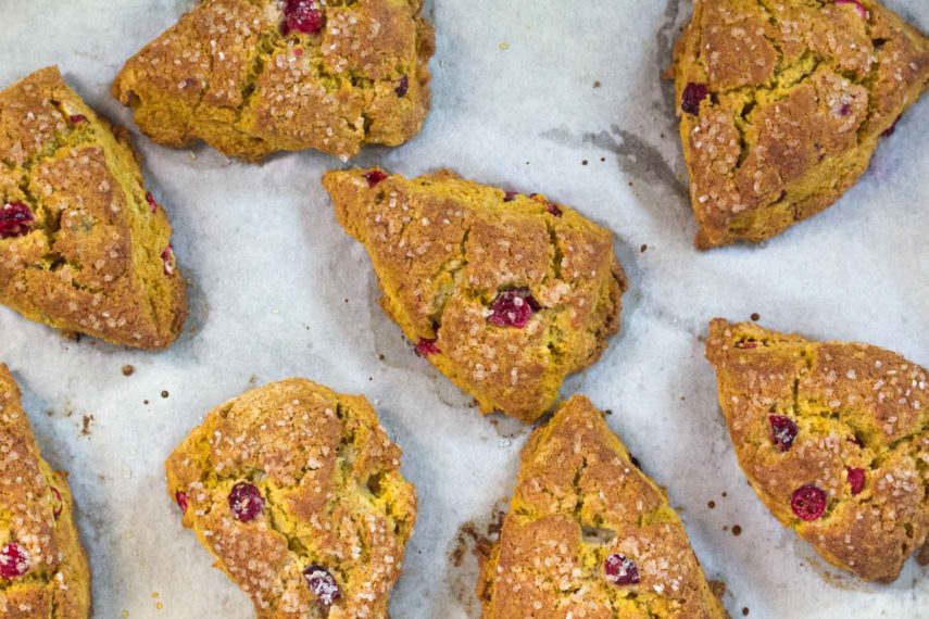 pumpkin cranberry scones on pan lined with parchment