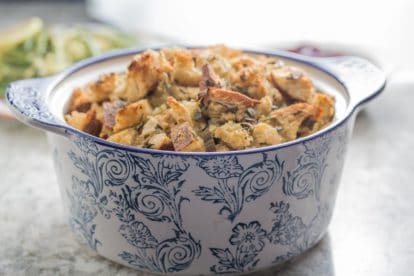 low FODMAP simple sourdough stuffing in a blue and white casserole dish