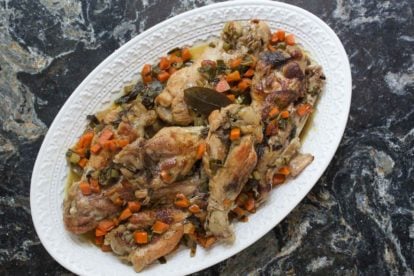 Braised turkey wings with white wine on a platter