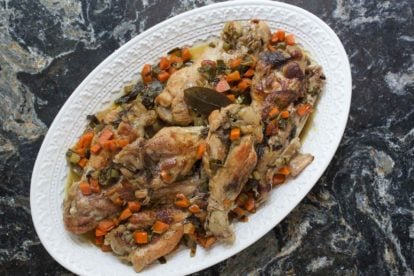 Braised turkey wings with white wine on a platter