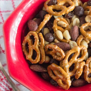 low FODMAP snack mix combining pretzels, almonds, peanuts, chocolate chips and raisins