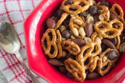 low FODMAP snack mix combining pretzels, almonds, peanuts, chocolate chips and raisins