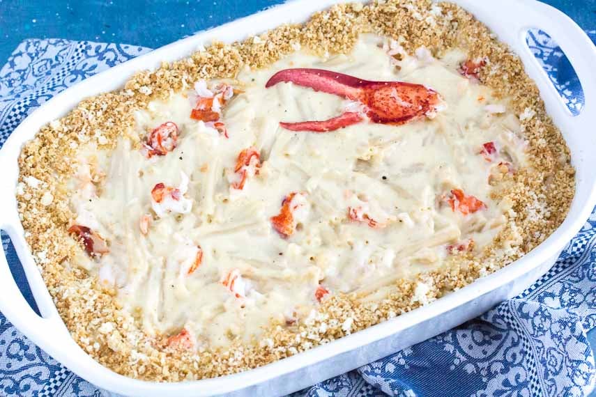 lobster mac n cheese in large white casserole dish