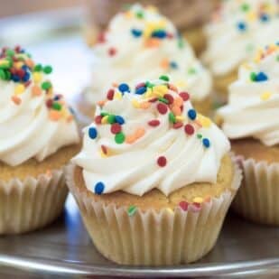 low FODMAP white cupcakes with sprinkles.