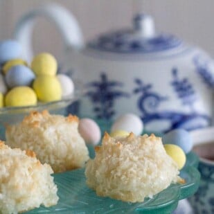 coconut macaroons with blue and white teapot in background