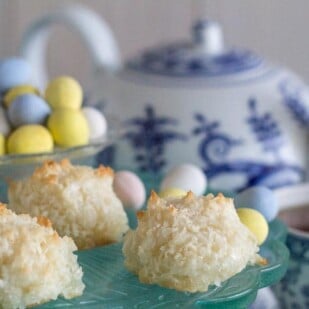 coconut macaroons with blue and white teapot in background