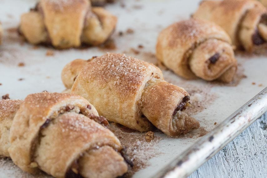 closeup of low FODMAP rugelach on parchment lined pan