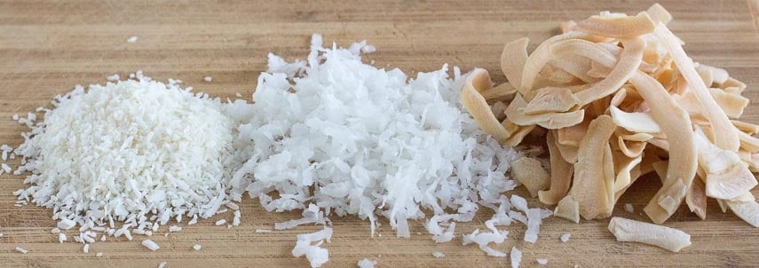 Is Coconut Low FODMAP? -coconut comparison, left to right: unsweetened desiccated; sweetened angel flake/long shred; large flakes