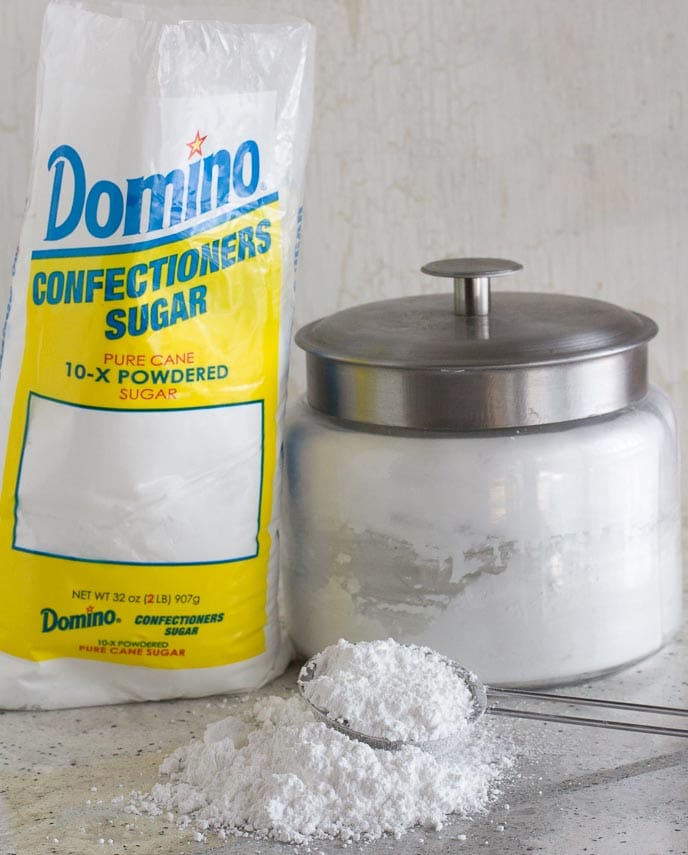 confectioners' sugar in a bag and on counter