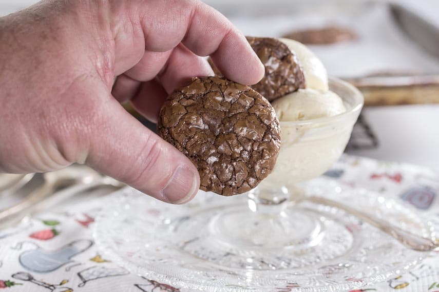 Brookie in man's hand; brookies are shaped like cookies but taste like brownies