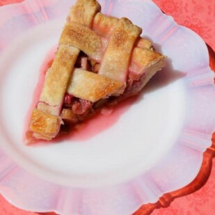 Rhubarb-pie-slice on fluted white plate