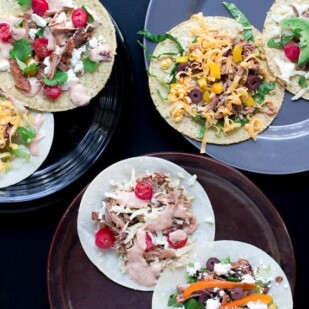 Shredded Pork Tacos on corn tortillas with various low FODMAP toppings
