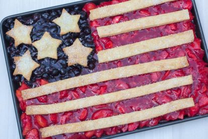 Flag Slab Pie in a baking pan against a white and gray quartz background