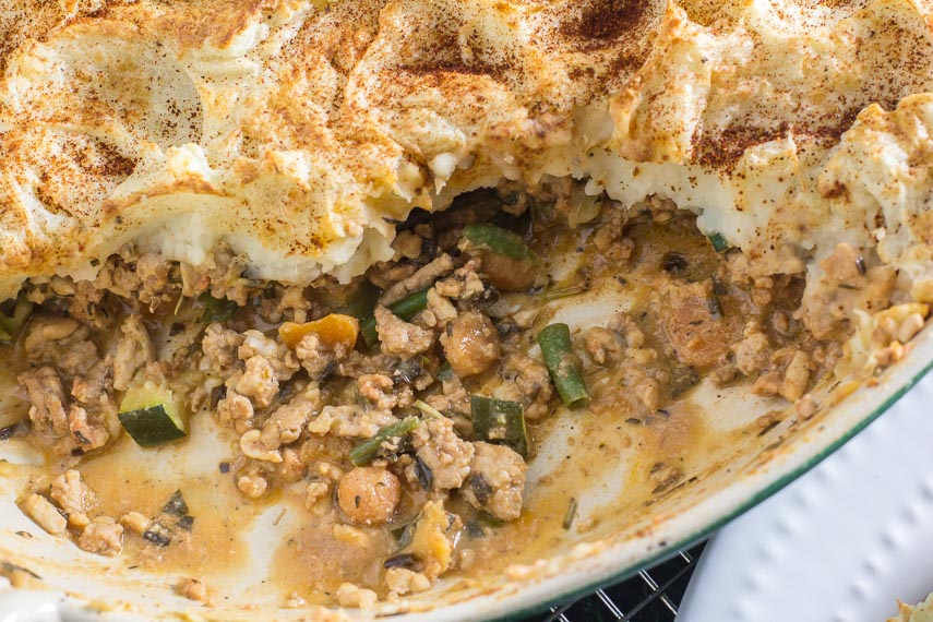 turkey shepherd's pie in casserole showing filling and mashed potato topping