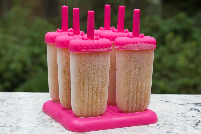 Arnold Palmer Ice Pops in a pink and clear popsicle mold set, frozen solid