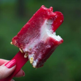strawberry yogurt granola popsicles with bite out