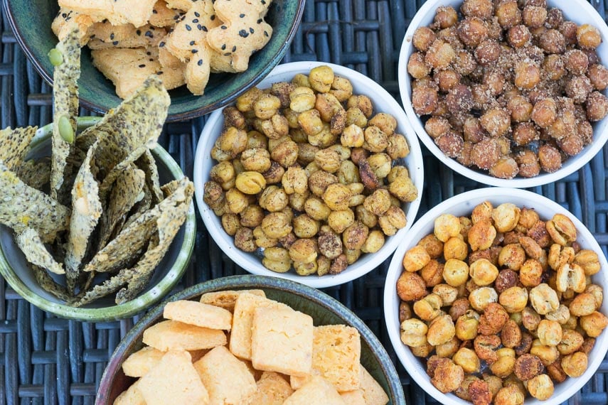 overhead of roasted chickpeas alongside other low FODMAP snacks