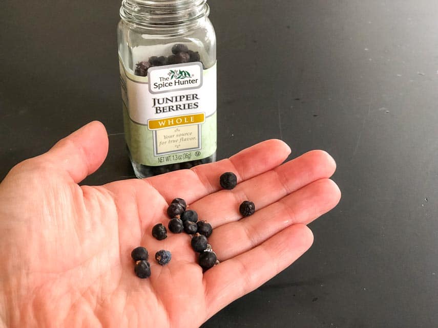 Juniper berries in hand