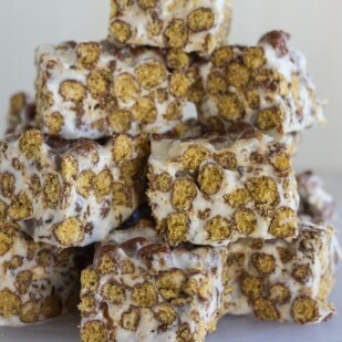 closeup of Chocolate Toasted Marshmallow Treats on white background