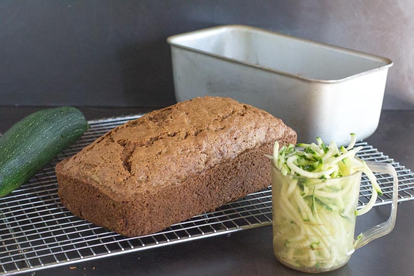loaf of low FODMAP zucchini bread cooling on rack