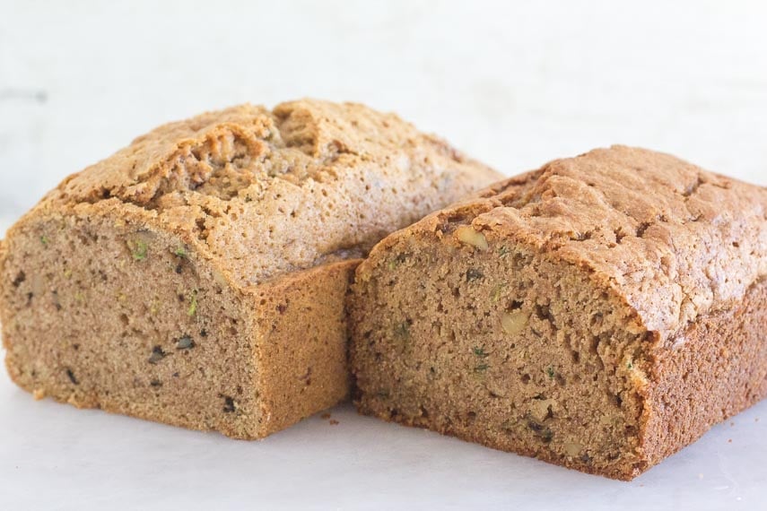 loaves of Zucchini bread on a white surface