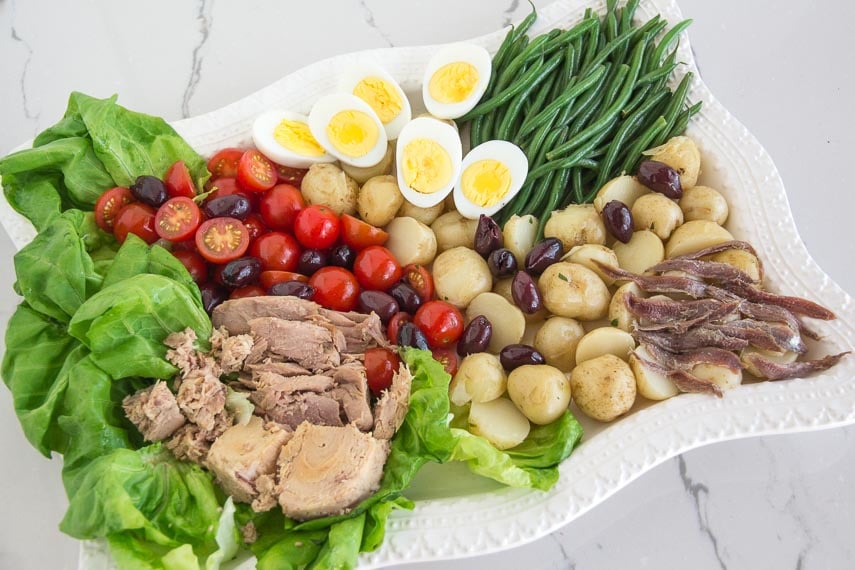 low FODMAP salade nicoise on rectangular white platter