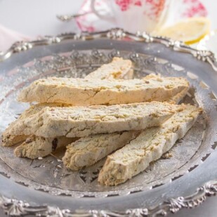 low FODMAP anise almond biscotti on a silver plate