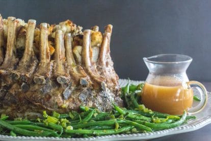 low fodmap crown roast of pork against dark background