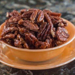 Bowl of low FODMAP Candied Spiced Pecans