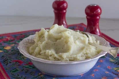 Low FODMAP Vegan Garlic Mashed Potatoes with salt and pepper shakers