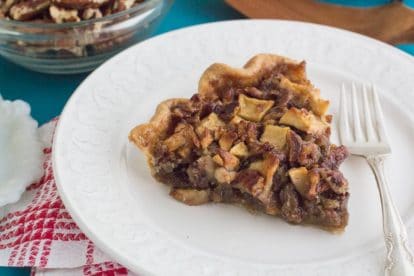 Low FODMAP Salted Caramel Apple Pecan Pie on a white plate