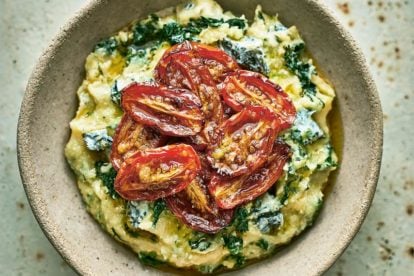 Spinach and Blue Cheese Polenta with Slow-Roasted Tomatoes in a rustic bowl