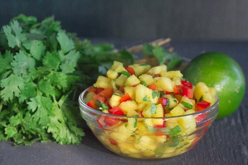 low FODMAP pineapple salsa in clear glass bowl