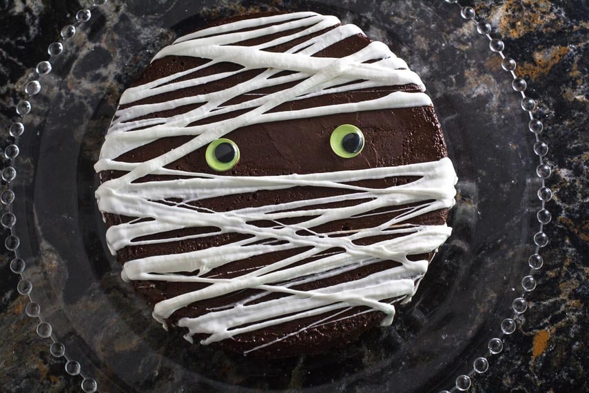 overhead image of Flourless chocolate cake with Mummy decoration