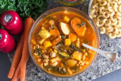 overhead of Low FODMAP Vegetable, Pasta & Bean Soup with ingredients